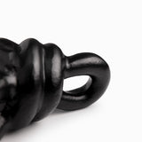 Nudo negro en metal